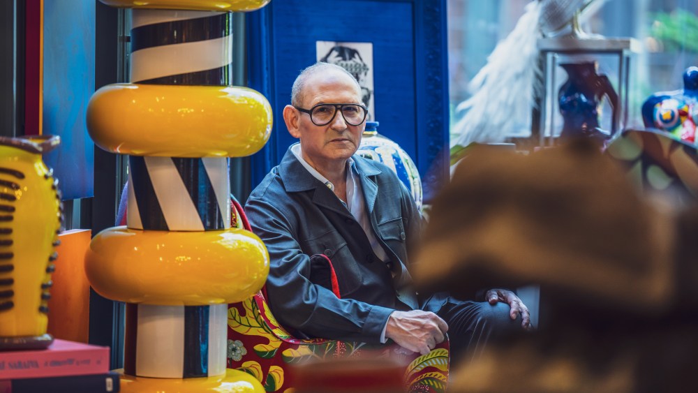 John Demsey in his second floor living room with a totem pole by Ettore Sottsass.