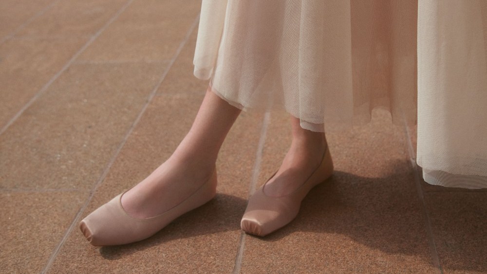 The Mikayla ballet flat in Champagne satin.