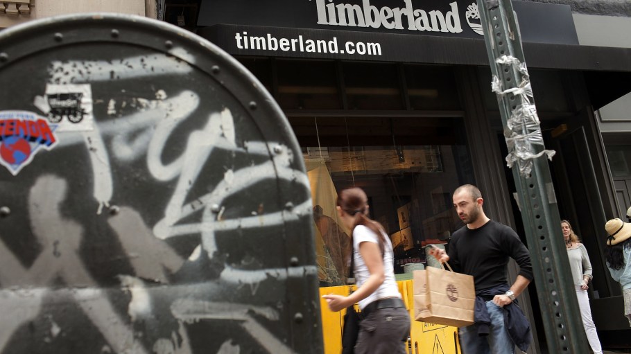 People walk by a Timberland store on June 13, 2011 in New York City.