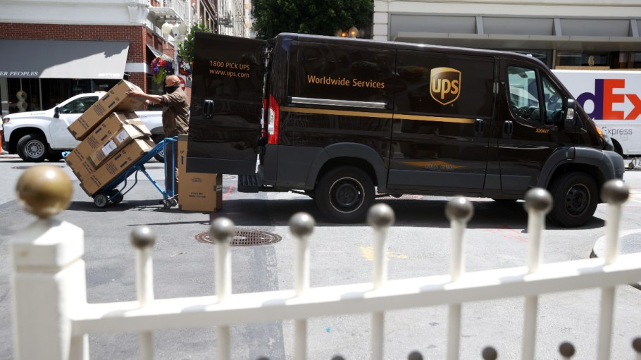 A UPS worker delivers packages in San Francisco.