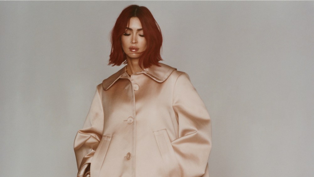 Altuzarra satin coat; Maison Margiela pumps; Wolford tights; Pamela Love necklace.