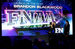 Karreuche Tran presents the  Launch of the Year Award to Brandon Blackwood.