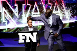 Shaquille O’Neal presents the Company of the Year Award for Authentic Brands Group to Jamie Salter.