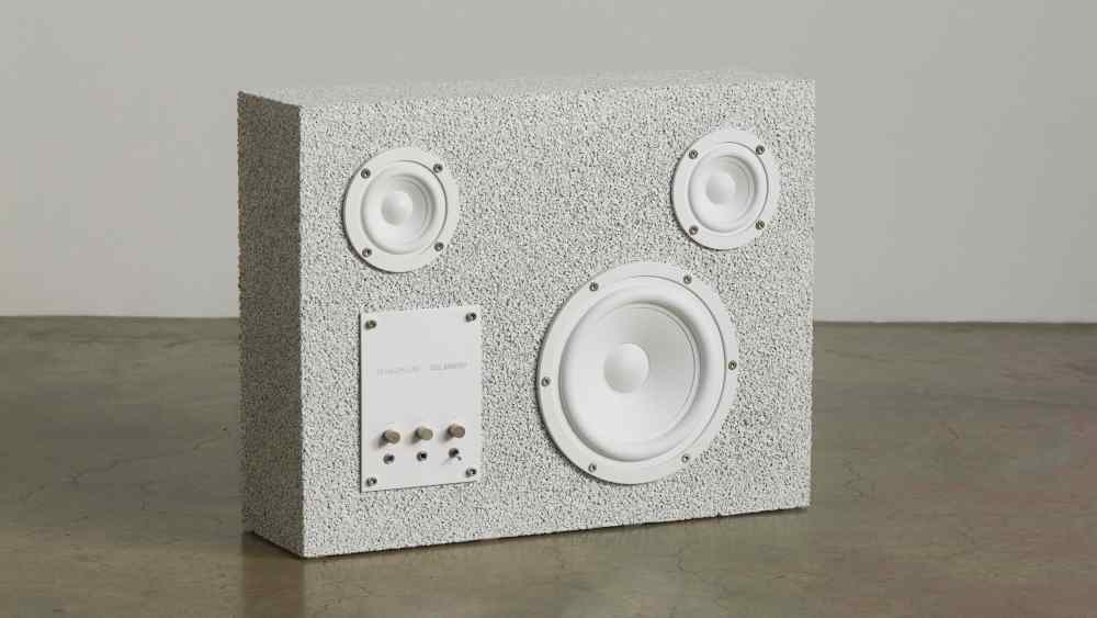 An Axel Arigato x Transparent speaker.