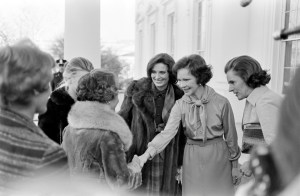 Margaret Trudeau (C) and Rosalynn Carter (2nd from R) visit the vice-presidential residence, Number One Observatory Circle, in Washington, D.C., on February 2, 1977.
