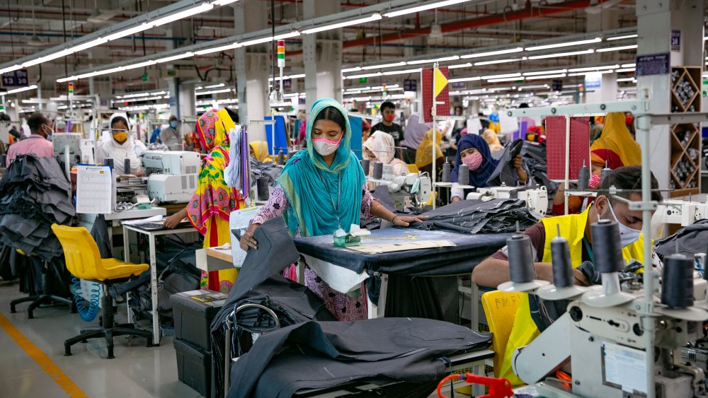 Garment workers work at a factory in Dhaka, Bangladesh.