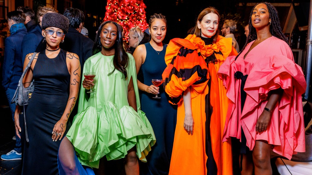 Roksanda Ilinčić, second on the right, fetes Christmas Tree unveil  with guests in boutique hotel Pulitzer in Amsterdam.