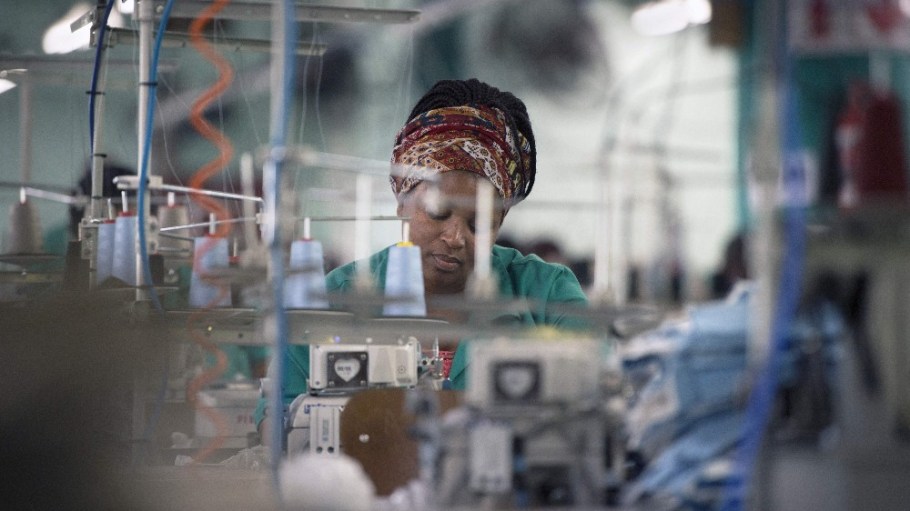 A worker at Kinross Clothing manufacturers in Maitland sews men's trousers in Cape Town, South Africa.