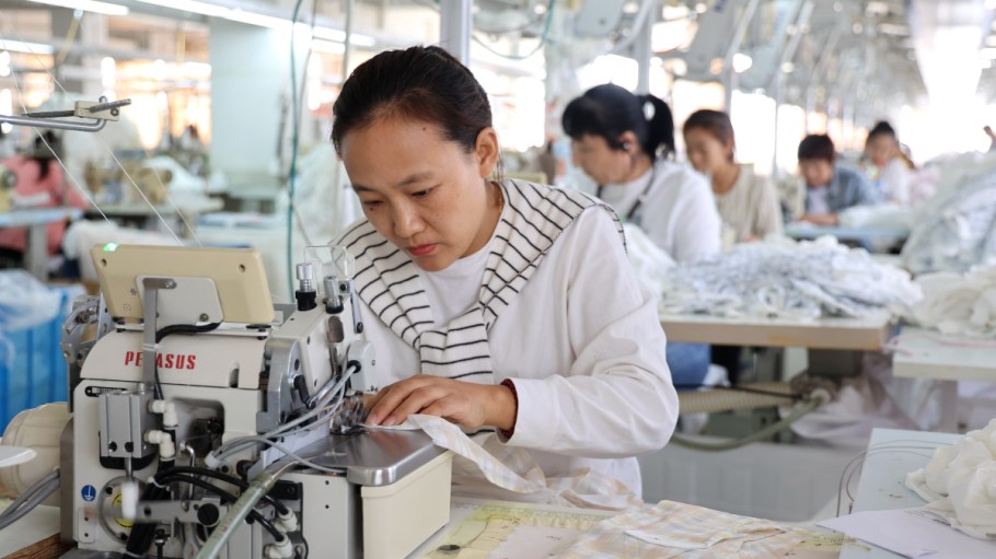 BINZHOU, CHINA - OCTOBER 27, 2023 - Workers work at a garment manufacturing company in Binzhou, East China's Shandong province, Oct 27, 2023.