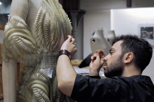 Several tulle panels with parametric petal arrays were hand-stitched onto a nude-illusion tulle base, creating van Herpen’s ‘Foliage’ dress.