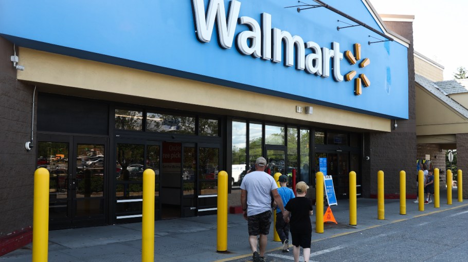 Walmart logo is seen on the storefront in Williston, Vt., on June 19, 2023.