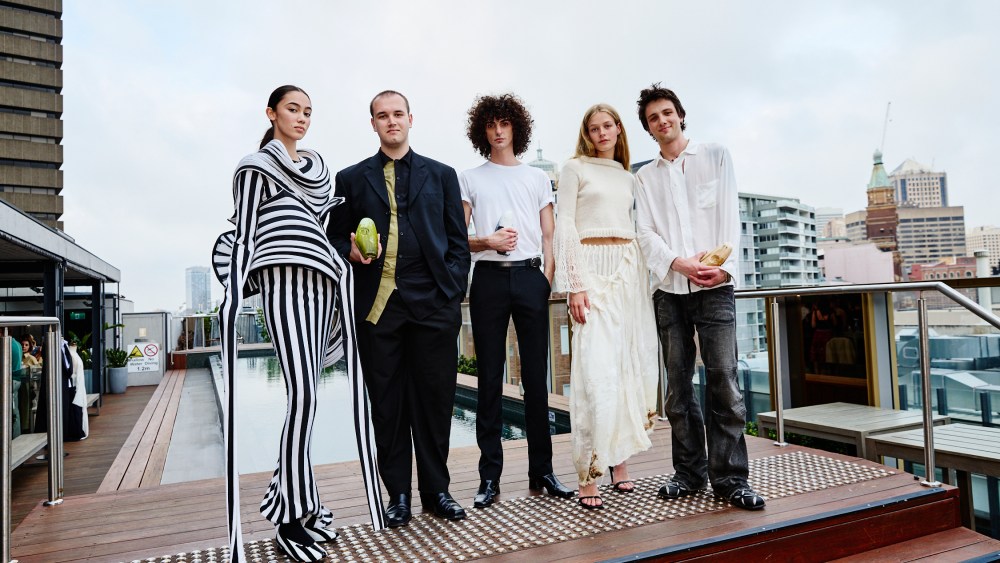The Australian Fashion Foundation scholarship award winners for 2024, Alexander Enticknap, Blake Sutherland and Sean McCallum, with models in looks from Enticknap's and McCallum's graduate collections.