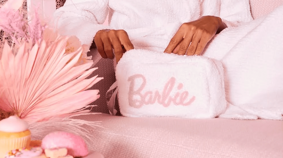 Barbie gift on a pink couch