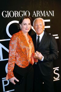 PARIS, FRANCE - JANUARY 21:  (L-R) Kristin Scott Thomas and Giorgio Armani pose backstage after the Giorgio Armani Prive show as part of Paris Fashion Week Haute Couture Spring/Summer 2014 at Palais de Tokyo on January 21, 2014 in Paris, France.  (Photo by Bertrand Rindoff Petroff/Getty Images)