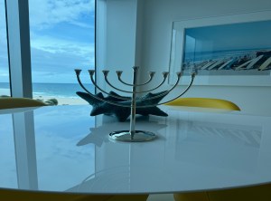 "For Hanukkah I love lighting the candles and eating homemade latkes. Being a true southerner, we always serve ours with fried chicken. On Christmas Day I go out to eat with my partner, and we always take in the latest movie. We round off the season with New Year’s Eve in South or Palm Beach [Florida]." - Jeffrey Kalinsky, Theory