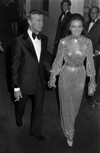 Johnny Carson (L) and Joanna Holland attend a party celebrating Carson's 10th anniversary as the host of 'The Tonight Show' in Los Angeles, California, on September 30, 1972. Joanna Carson wears a sequined gown by American couturier Norman Norell.