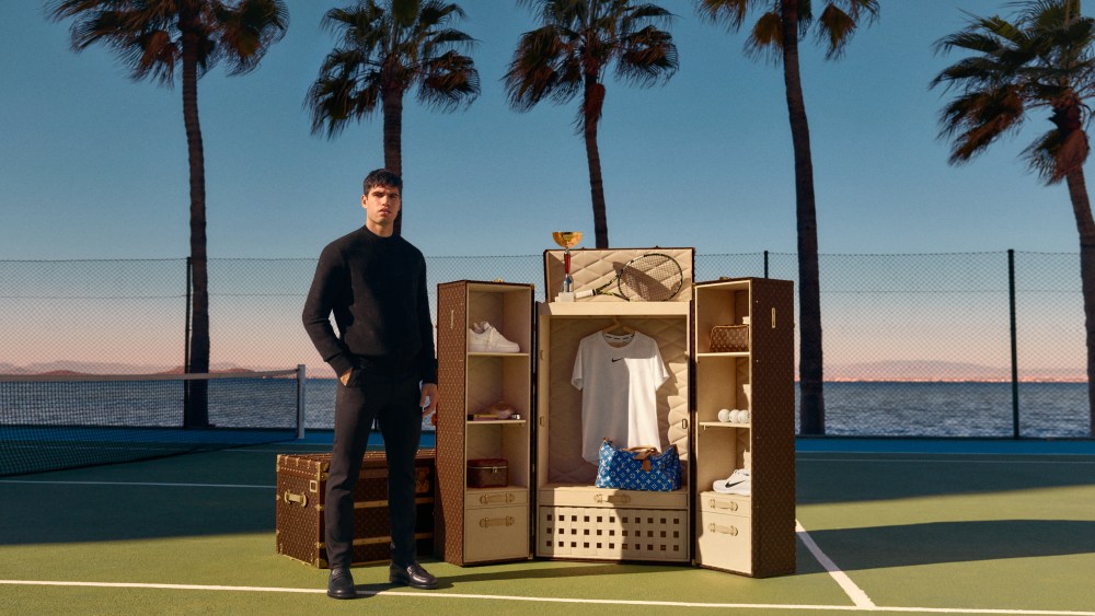 Carlos Alcaraz with his Louis Vuitton Malle Vestiaire trunk