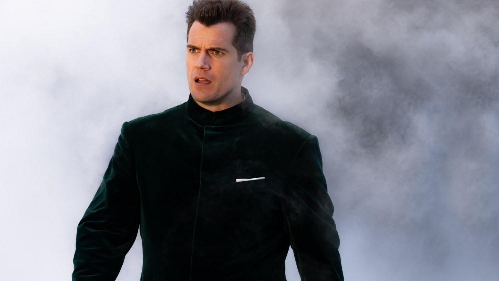 Henry Cavill sports a green velvet jacket from the Mr Porter Argylle by Kingsman capsule as the agent Argylle in Argylle, directed by Matthew Vaughn