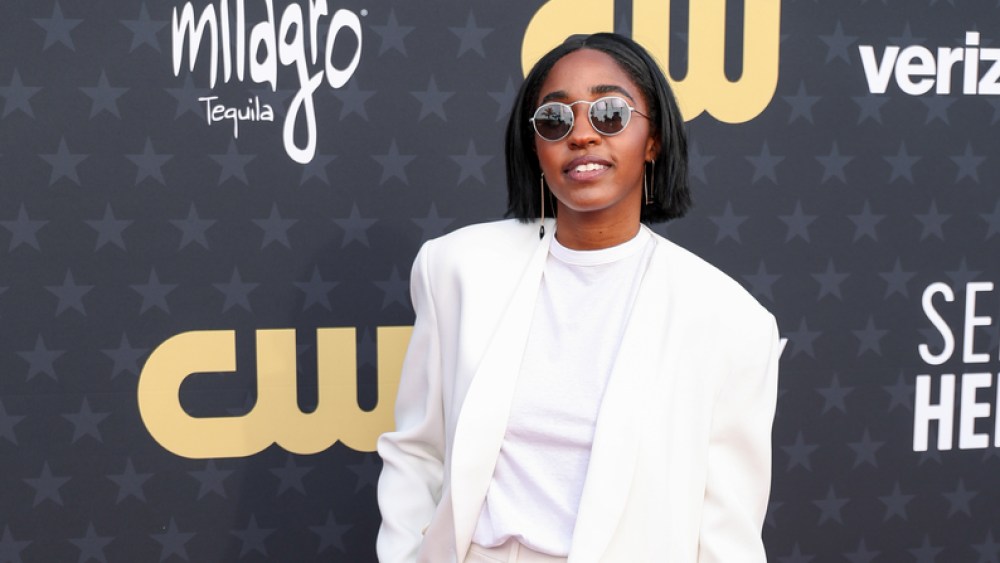 Ayo Edebiri in The Row at The 29th Critics' Choice Awards held at The Barker Hangar on January 14, 2024 in Santa Monica, California.
