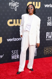 Ayo Edebiri in The Row at The 29th Critics' Choice Awards held at The Barker Hangar on January 14, 2024 in Santa Monica, California.
