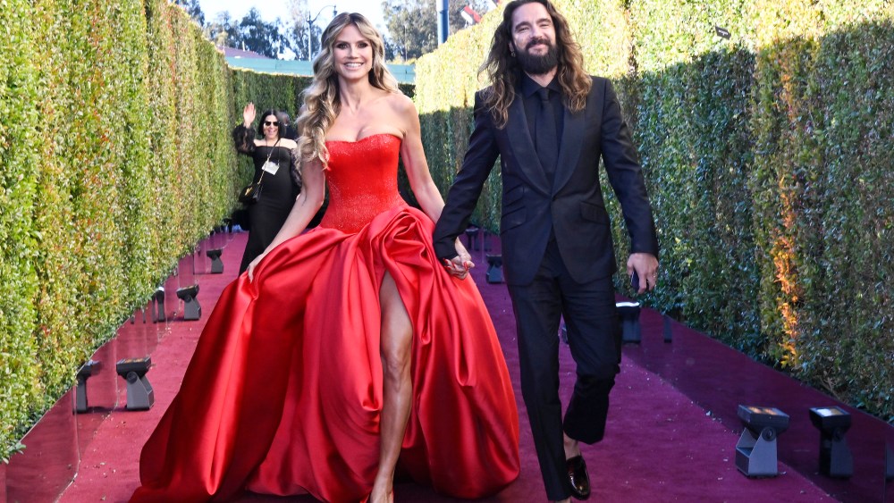 Heidi Klum and Tom Kaulitz walking the red carpet at the 2024 Golden Globe Awards.