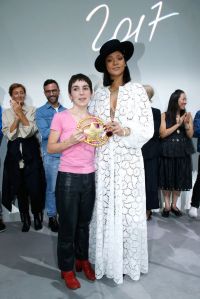PARIS, FRANCE - JUNE 16:  Singer Rihanna gives the price to the Winner of  the "Young Fashion Designer" LVMH Prize 2017, Stylist Marine Serre during the "Young Fashion Designer" : LVMH Prize 2017 Edition at Fondation Louis Vuitton on June 16, 2017 in Paris, France.  (Photo by Bertrand Rindoff Petroff/Getty Images)