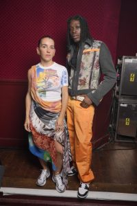 Designer Marine Serre and Fireboy at the Marine Serre Spring 2024 Menswear Collection Fashion Show at Salle Wagram on June 24, 2023 in Paris, France.