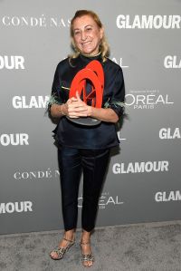 LOS ANGELES, CA - NOVEMBER 14:  Honoree Miuccia Prada poses with an award during Glamour Women Of The Year 2016 at NeueHouse Hollywood on November 14, 2016 in Los Angeles, California.  (Photo by Frazer Harrison/Getty Images for Glamour)