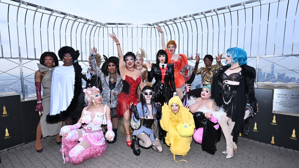 NEW YORK, NEW YORK - JANUARY 04: (L-R) Xunami Muse, Sapphira Crist√°l, Mirage, Geneva Karr, Mhi'ya Iman LePaige, Q, Morphine Love Dion, Dawn, Plane Jane, Nymphia Wind, Plasma, Megami, Hershii LiqCour-Jet√© and Amanda Tori Meating pose as Season 16 Cast of RuPaul's Drag Race visits The Empire State Building on January 04, 2024 in New York City. (Photo by Roy Rochlin/Getty Images for Empire State Realty Trust)