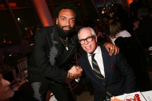 Kerby Jean-Raymond and Tommy Hilfiger at the 33rd Annual Footwear News Achievement Awards, 2019.
