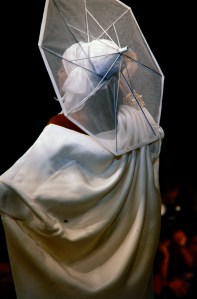 A model walks in the Claude Montana Spring 1984 Ready to Wear Runway Show on October 15, 1983, in Paris, France.
