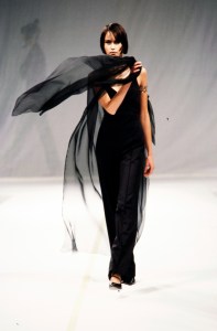 Model Natalia Semanova walks in the Claude Montana Spring 1998 Ready to Wear Runway Show on October 16, 1997, in Paris, France.