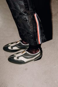 Backstage at the Thom Browne fall 2024 ready-to-wear show at New York Fashion Week.