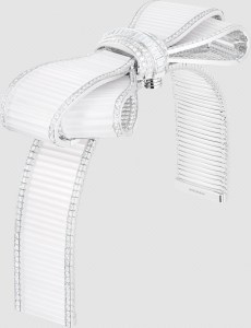 Boucheron’s Noeud shoulder brooch version of the necklace set with a 4.05 ct pear-cut diamond and rock crystal, paved with diamonds, in white gold
