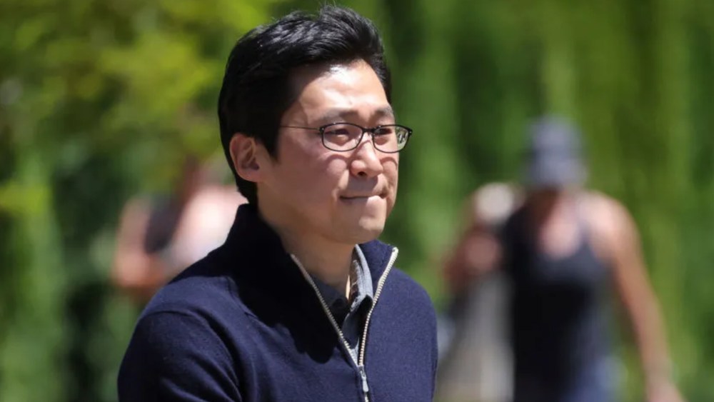 Bom Kim, founder of Coupang, in blue sweater