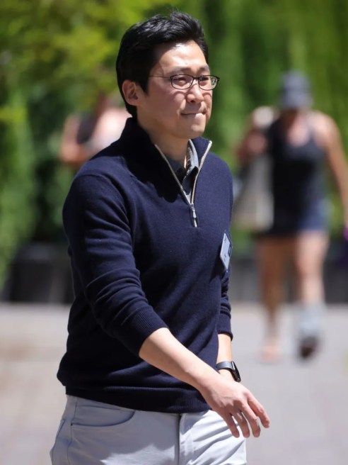 Bom Kim, founder of Coupang, in blue sweater