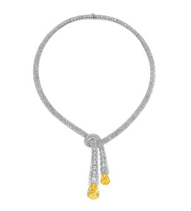 Graff Fancy Intense Yellow Pear Shape Diamond Necklace, with White Oval, Round and Baguette Diamond Cross Over, set in Yellow and White Gold (total 68.69cts)