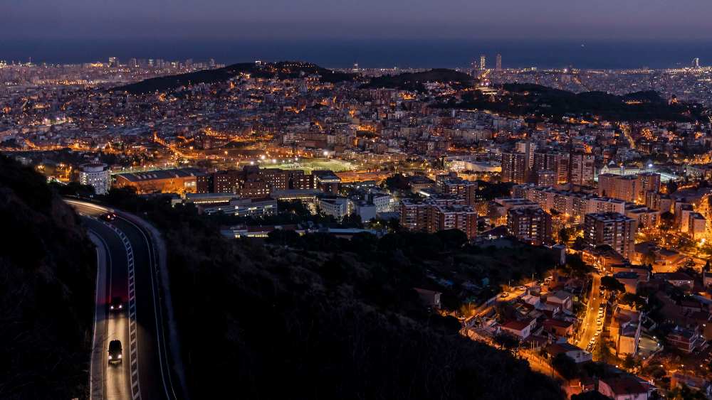 A panoramic views of Barcelona at sunset from Tibidabo.