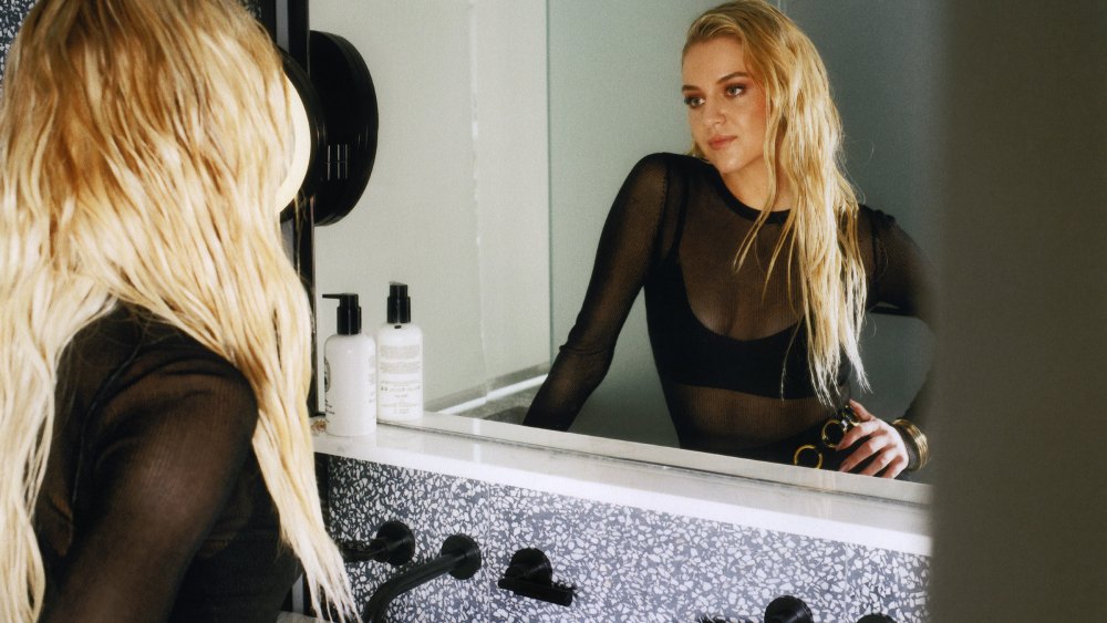 A look at Kelsea Ballerini getting ready for the Michael Kors fall 2024 show.