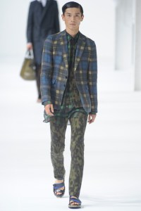 A model on the runway at Dries Van Noten's spring 2013 menswear show.