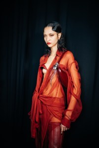 Backstage at the Mugler fall 2024 ready-to-wear show at Paris Fashion Week.