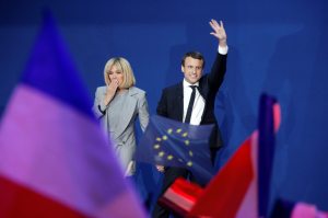 ' Emmanuel Macron, flanked by his wife Brigitte Trogneux, speaks after projected results suggest that he has won the lead percentage of votes in the first round of the French Presidential Elections at Parc des Expositions Porte de Versailles on April 23, 2017 in Paris, France.