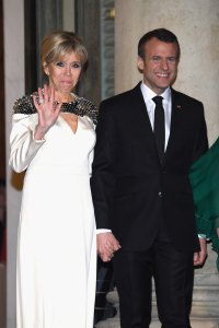 French President Emmanuel Macron and Brigitte Macron  attend a State dinner at the Elysee Palace on March 19, 2018 in Paris, France.