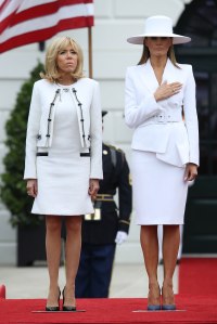 U.S. first lady Melania Trump welcomes French first lady Brigitte Macron, during an arrival ceremony at the White House April 24, 2018 in Washington, DC. Trump is hosting Macron for a two-day official visit that included dinner at George Washington's Mount Vernon, a tree planting on the White House South Lawn and a joint news conference.