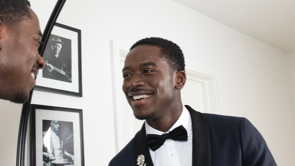 Damson Idris getting ready in Tommy Hilfiger for the 2024 NAACP Awards