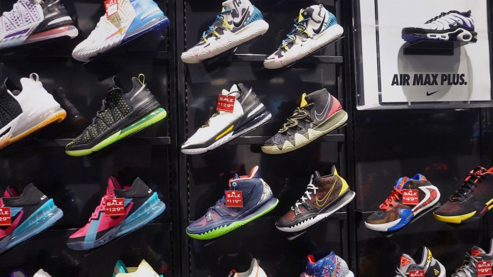 CHICAGO, ILLINOIS - AUGUST 02: Athletic footwear is offered for sale at a Foot Locker store on August 02, 2021 in Chicago, Illinois.  Foot Locker Inc. has announced plans to buy athletic retailer WSS for $750 million and Atmos, a Japan-based streetwear and sneaker company, for $360 million.  (Photo by Scott Olson/Getty Images)