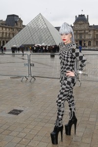 PARIS, FRANCE - JANUARY 20:  Lady Gaga poses in front of the Louvre museum on January 20, 2014 in Paris, France.  (Photo by Marc Piasecki/Getty Images)