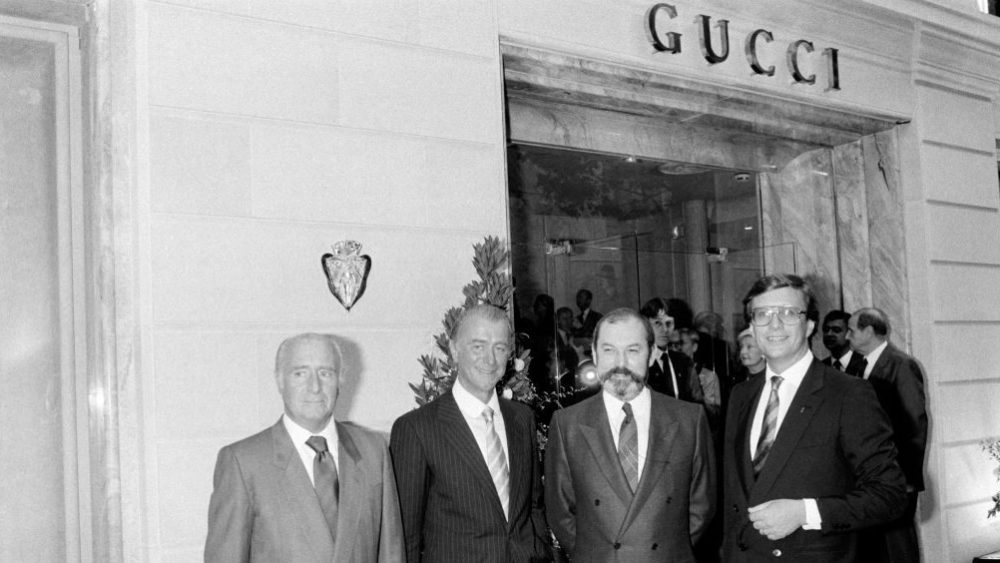 Guccio Gucci's grandsons Giorgio, Roberto and Maurizio Gucci (L to R) at a boutique opening in Paris in 1983.