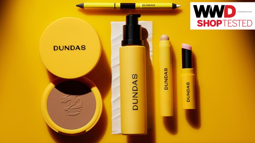 Peter Dundas beauty products that our editors tested on a yellow background