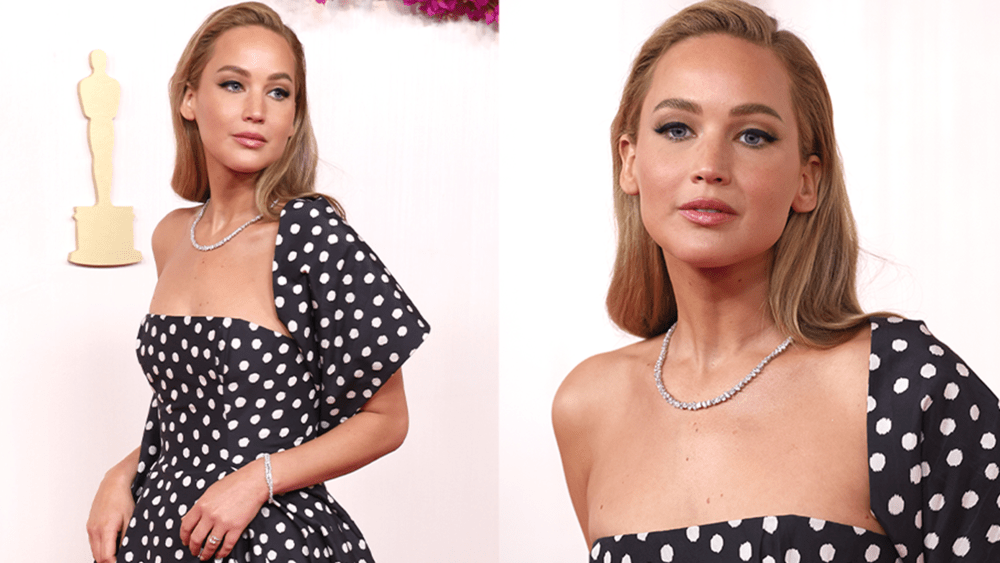 Jennifer Lawrence wearing a black and white polka dot dress, tennis bracelet, and tennis necklace at the Academy Awards; Jennifer Lawrence wearing a tennis necklace at the academy awards